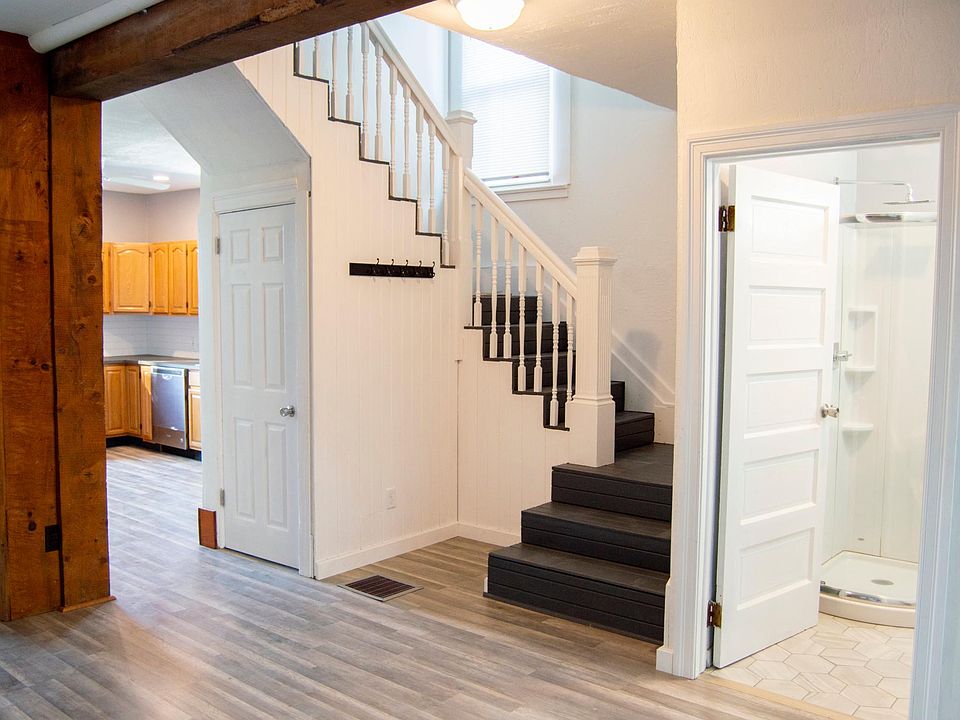 Bathroom, Entryway, Access to 2nd floor and basement.