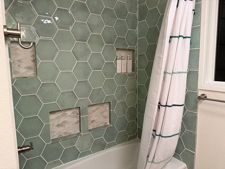 Custom tile surround on brand new bathtub