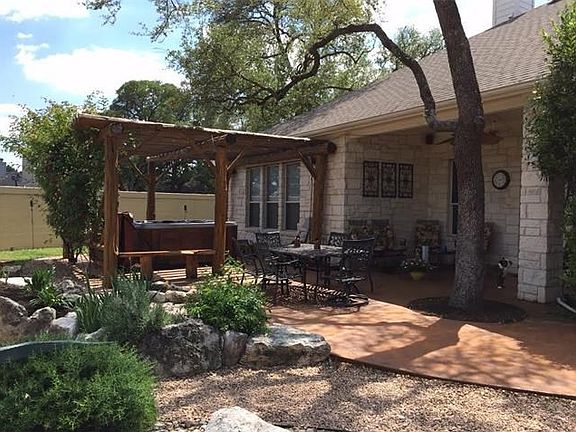 Extended Patio allows for plenty of seating options for guests. A great place for morning coffee or evening glass of wine. NOTICE:  The home is 4 sides stone.