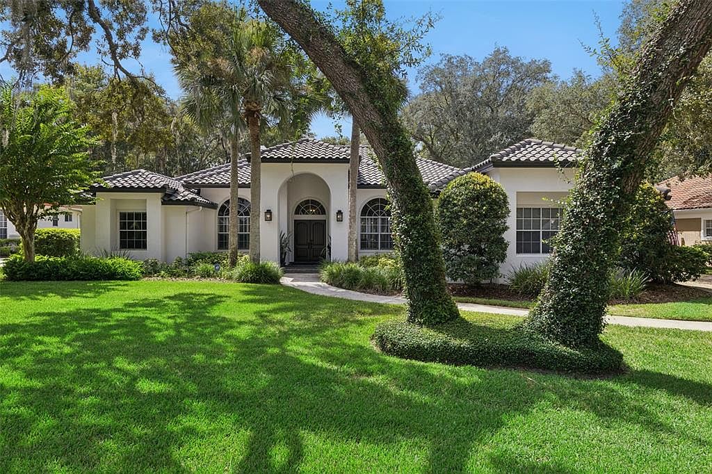 704 IRONWOOD COURT — Tuscawilla Country Club