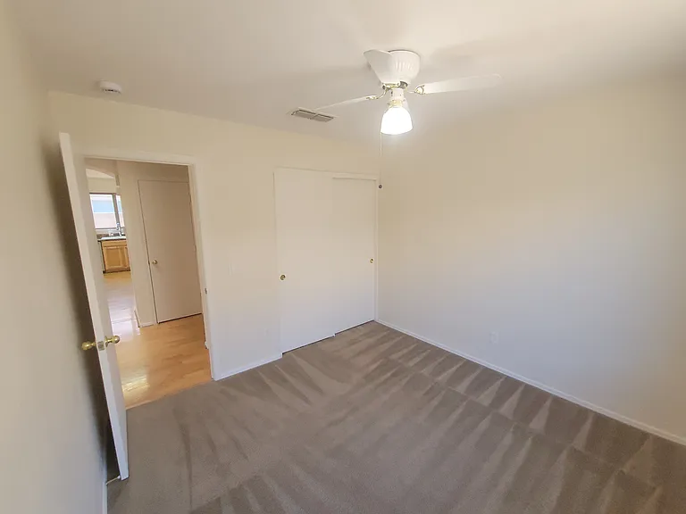 3rd bedroom w/ view of the closet