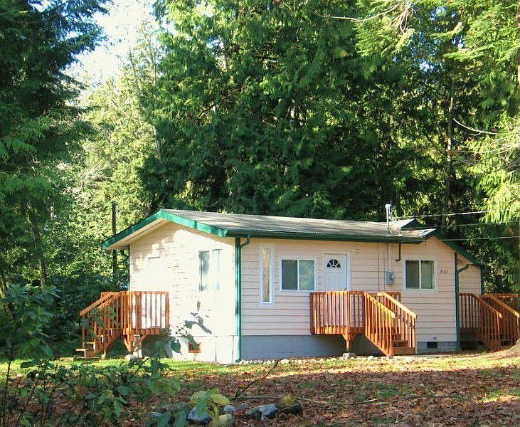 Serenity is the mood at this secluded cottage home surrounded by trees provides peaceful relaxation.