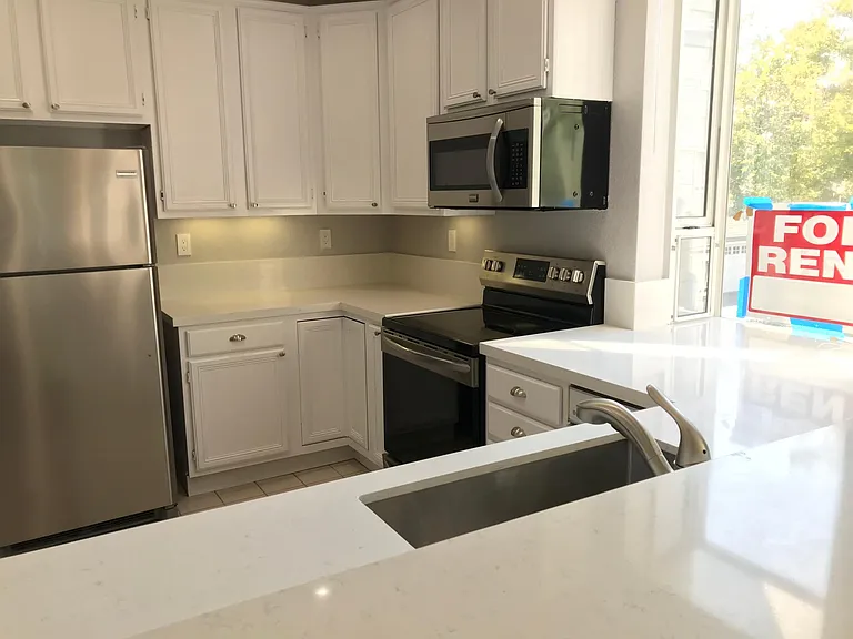 905 Sunrose Ter #209 — Photo 16