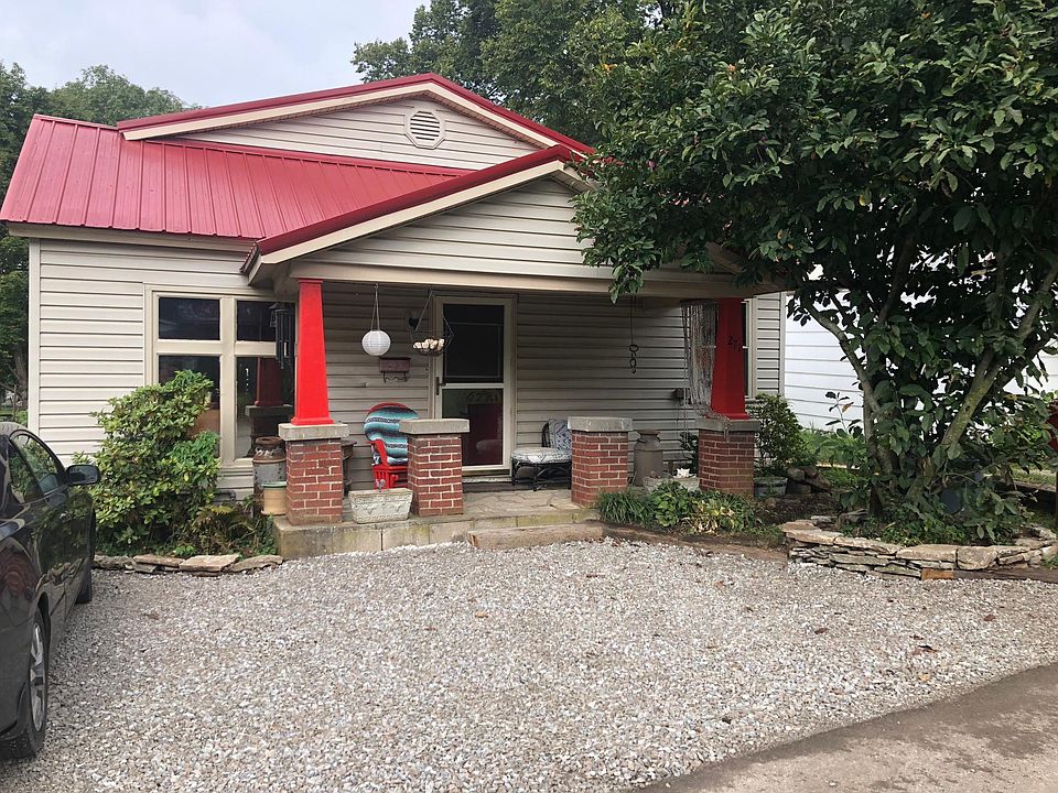 Front of home with two off street parking spots.