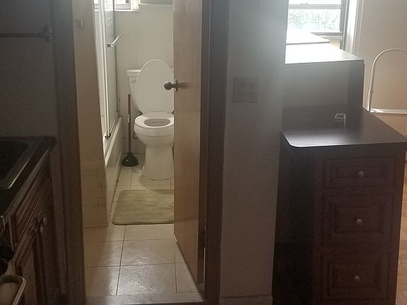 Full bathroom with tub