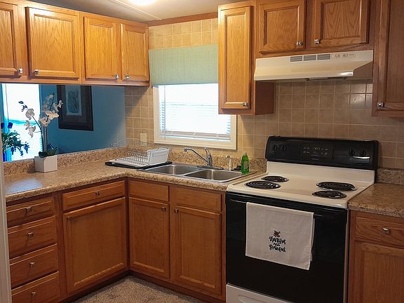 New microwave has been added, as well as other small appliances.