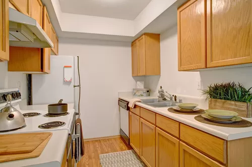 A kitchen with lots of counter space and cabinet storage - Lake Park