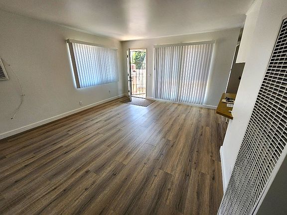 Spacious Living Room with 3 large windows