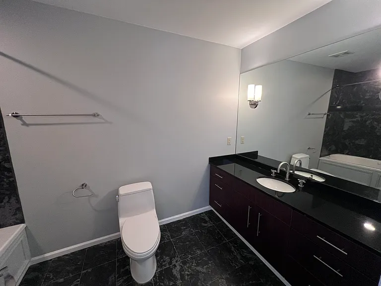 Lower level bedroom attached bathroom