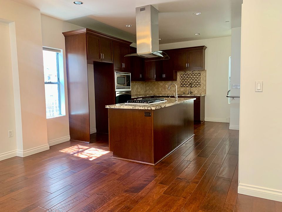 Kitchen View from Living Room. Front entry to the left