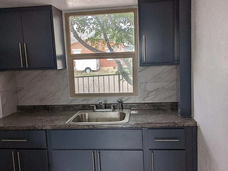 Kitchen sink and cabinets