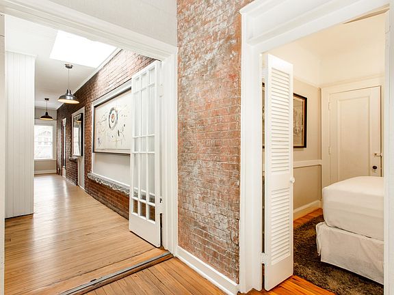 Exposed brick and modern appliances make this unit unique