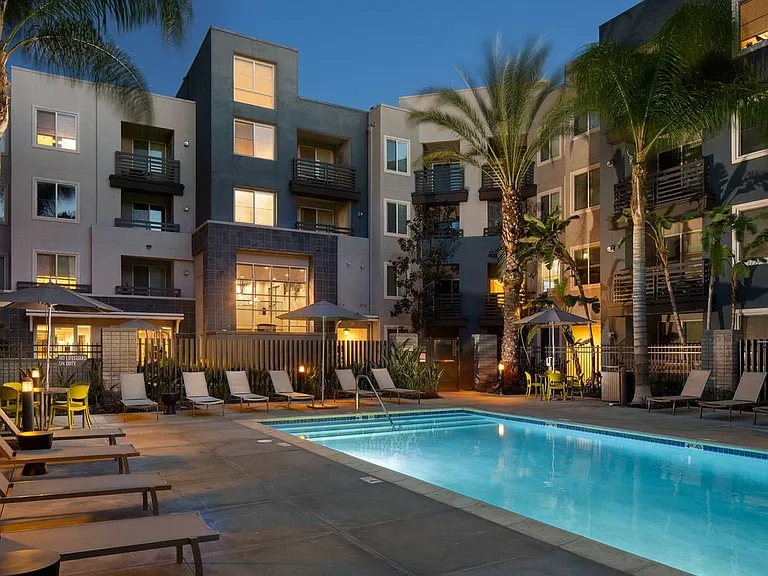 Swimming pool and sundeck at dusk