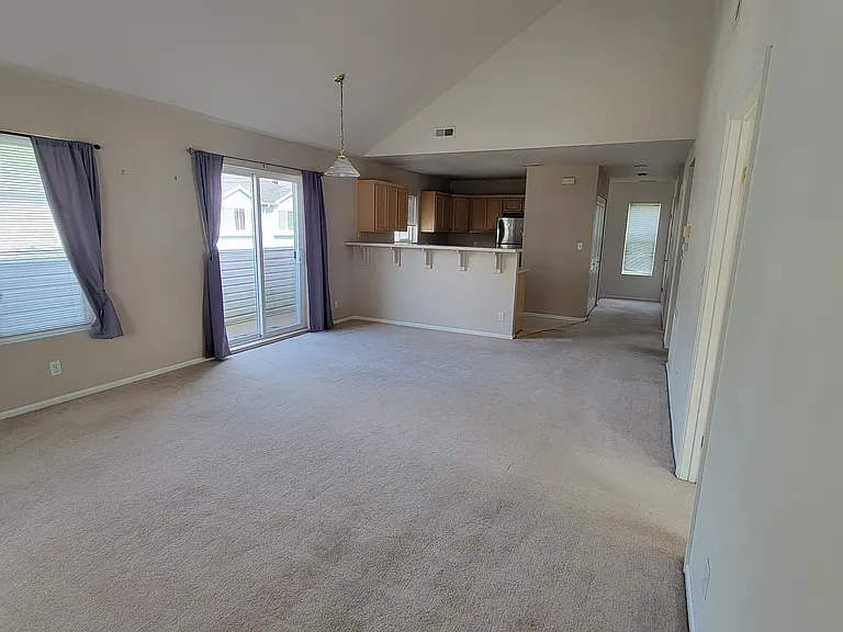 Entry to balcony next to kitchen