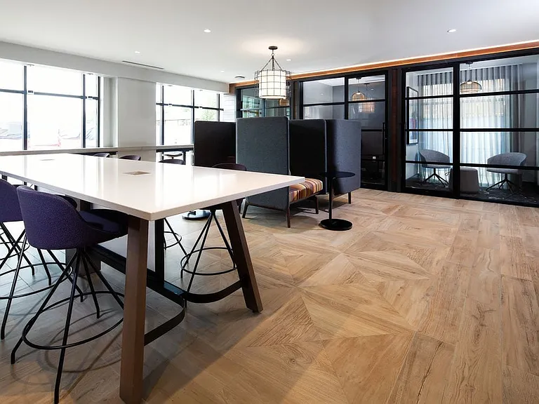 North Building Co-work lounge with multiple seating areas