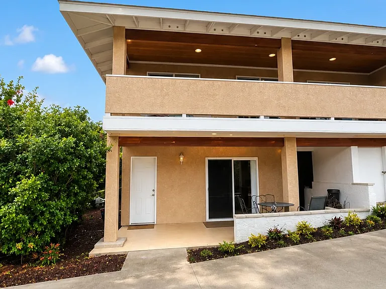 Private lanai, dedicated laundry down hallway to the right. Front door on the left, slider entry to the kitchen/dining area.