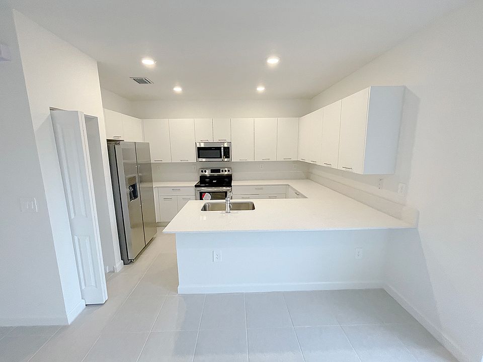 1st image of 12428 NW 23rd Ave #12428