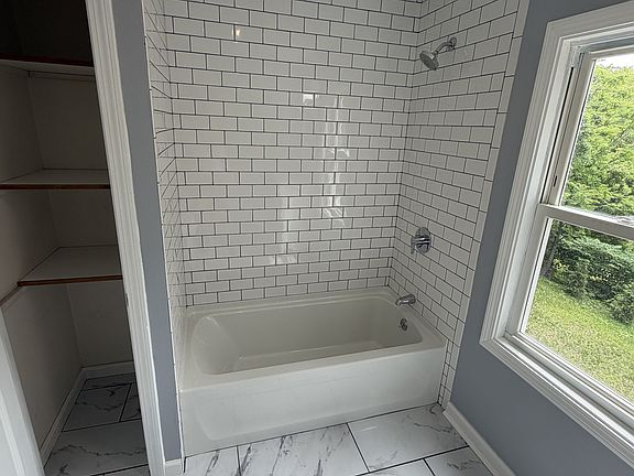 Shower and bathroom closet