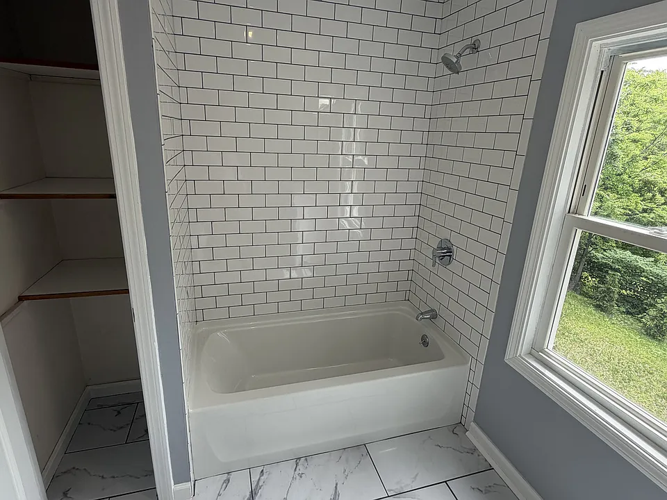 Shower and bathroom closet