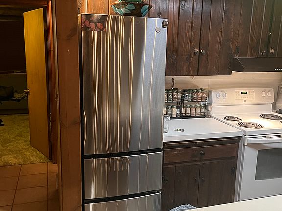Kitchen is stocked with everything needed. New refrigerator installed this summer.