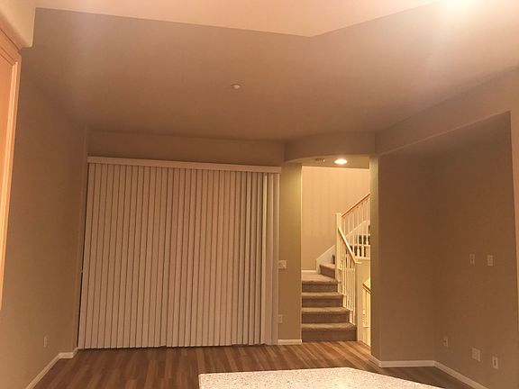 Living room with sliding door leading to balcony