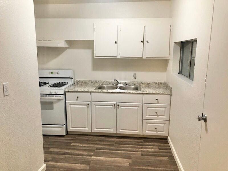 All new kitchen cabinets, sink and granite counter tops