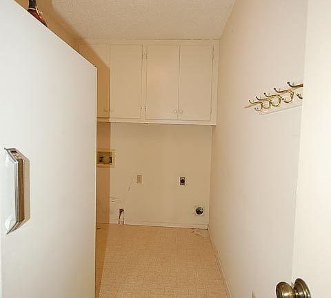 Spacious Laundry Room with Freezer