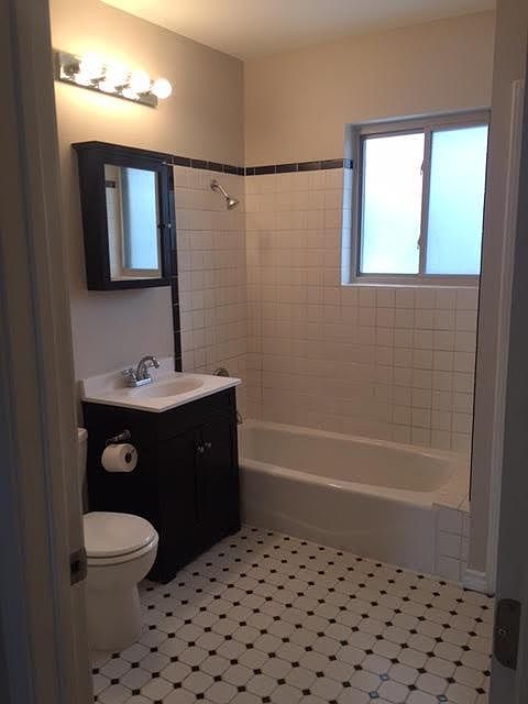 Spacious full bath with storage closet located on second flo