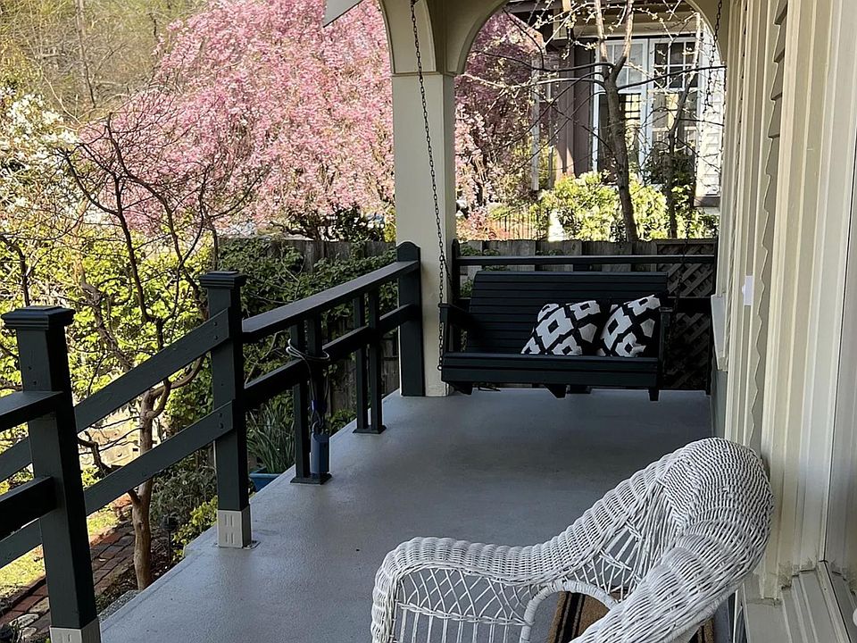 Front porch entry with porch swing