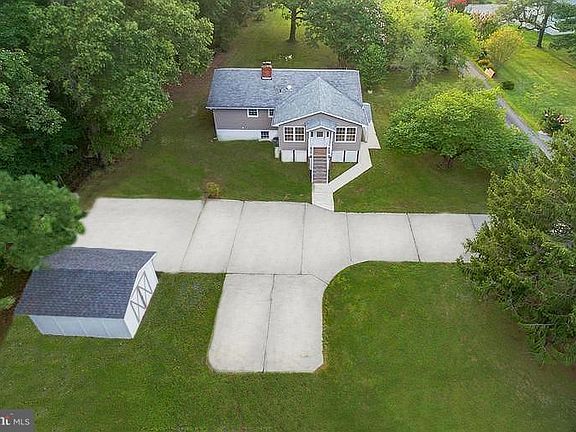 Aerial views of house and garage area. Quick ride to schools, shopping and access to Rt 4