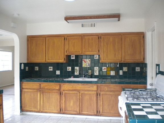 Large kitchen with skylights