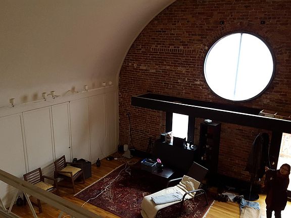 view from interior balcony into main space