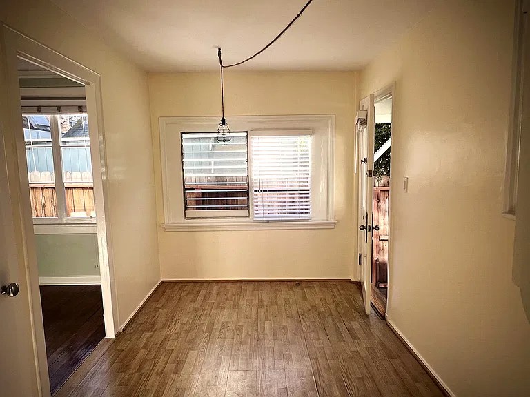 View from Kitchen into Breakfast Area/Front Door