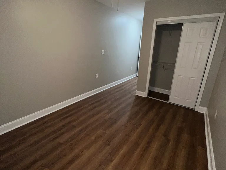 Rear Bedroom 2 with Modern fan and Closet