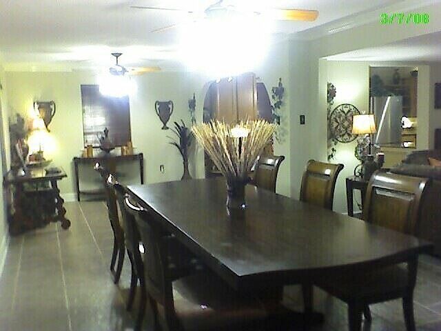 Dining area open to den & kitchen