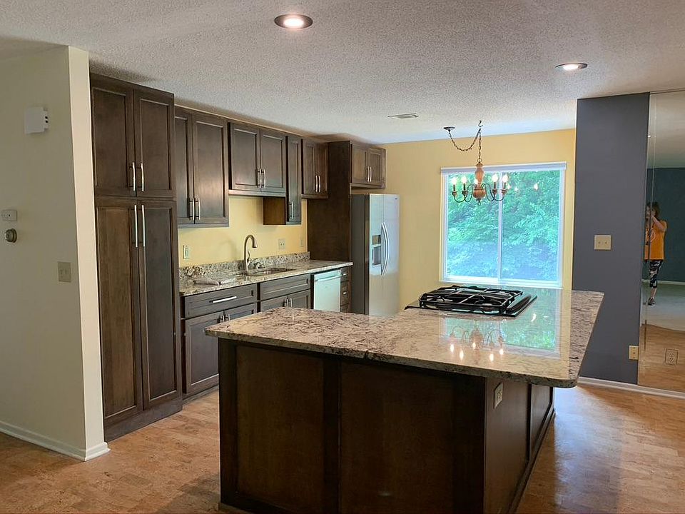 This kitchen has everything you need as well as a small area for a breakfast nook looking out to the wooded area behind the condo