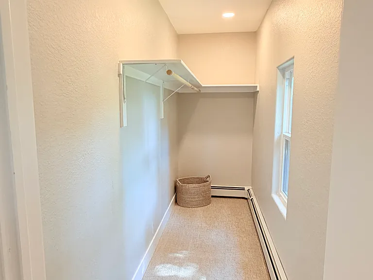 Walk-in closet in 2nd upstairs bedroom