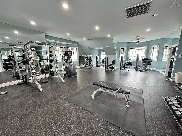 Massive gym fully equipped with several machines, free weights and all the space you need to workout!