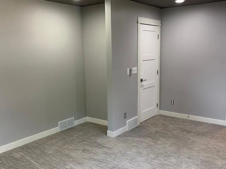 Master bedroom entry and view to master closet with window
