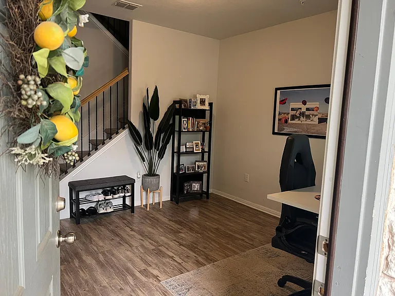 Front room to be used for an a second living room, office or dining room