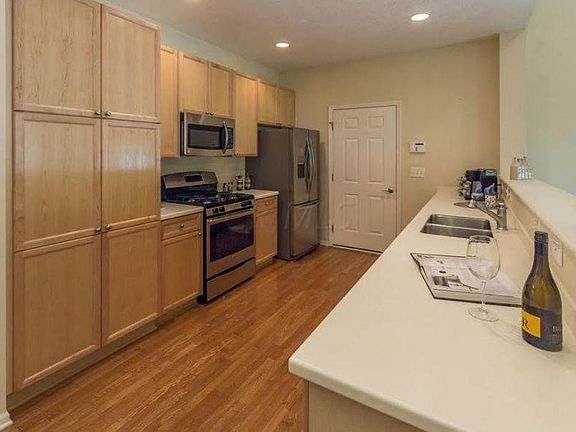 Kitchen with Corian countertops andbrand new Stainless Steel