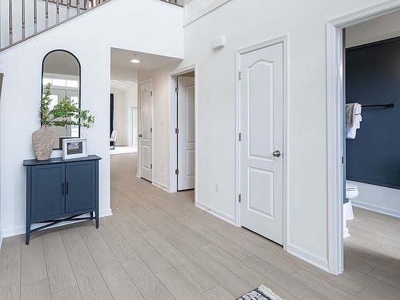 Elegant entryway and powder room of the Oakdale II plan, showcasing stylish design and inviting layo
