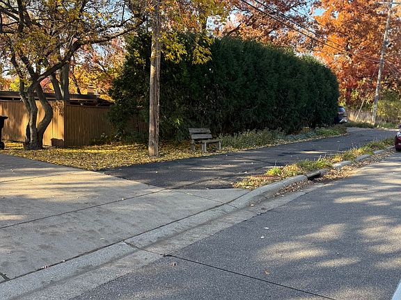 View of paved walking path across the street