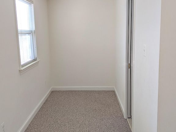 View of bedroom extension -- bathroom door is on right