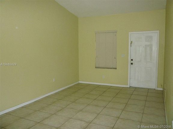 5th image of 6900 NW 179th St APT 212-1