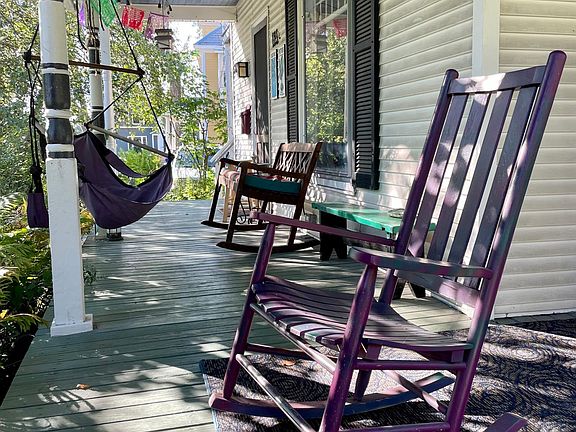 Front porch for a glass of wine or beer at the end of the day or to catch sunshine and read (south and east facing wraparound porch)