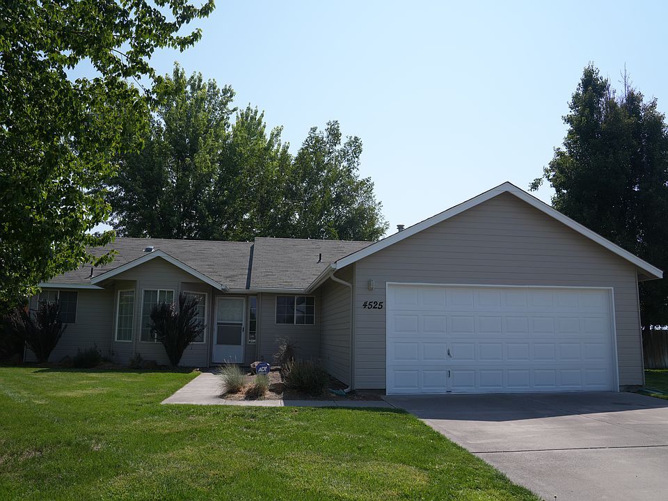 Front exterior with 2-car garage