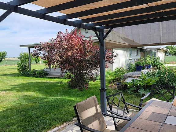 Landlord's gazebo in foreground, cottage in background