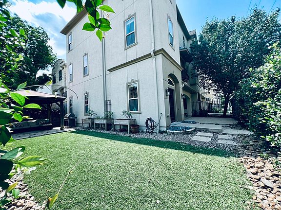 Beautiful corner lot!! Light on all three sides of home, uncommon for the neighborhood. OVER 1,200 sq ft fenced in yard with patio, gazebo, raised garden beds (blueberries included). Yard has artificial grass so perfect for little ones or pets (yes pets a