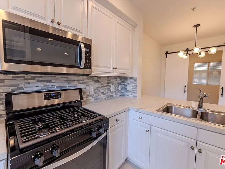 6020 Seabluff Dr #302 — Photo 13